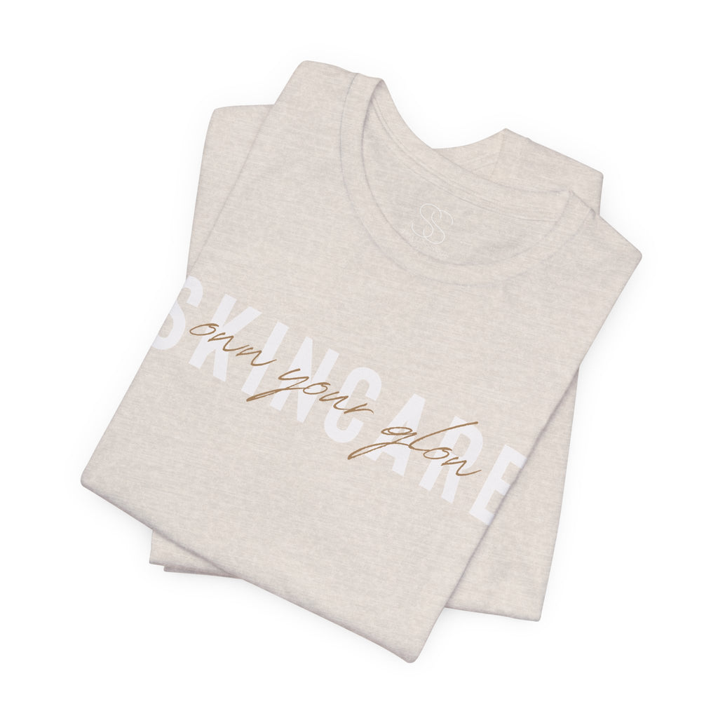 Skincare Graphic Tee — Own Your Glow Script Logo T-Shirt