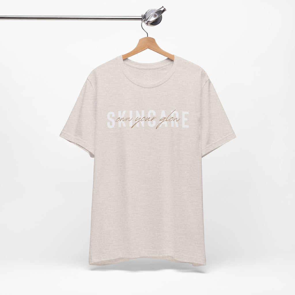 Skincare Graphic Tee — Own Your Glow Script Logo T-Shirt